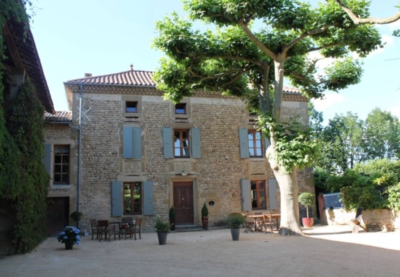 Maison à Chantemerle-les-Blés - Maison en galets avec piscine et jacuzzi